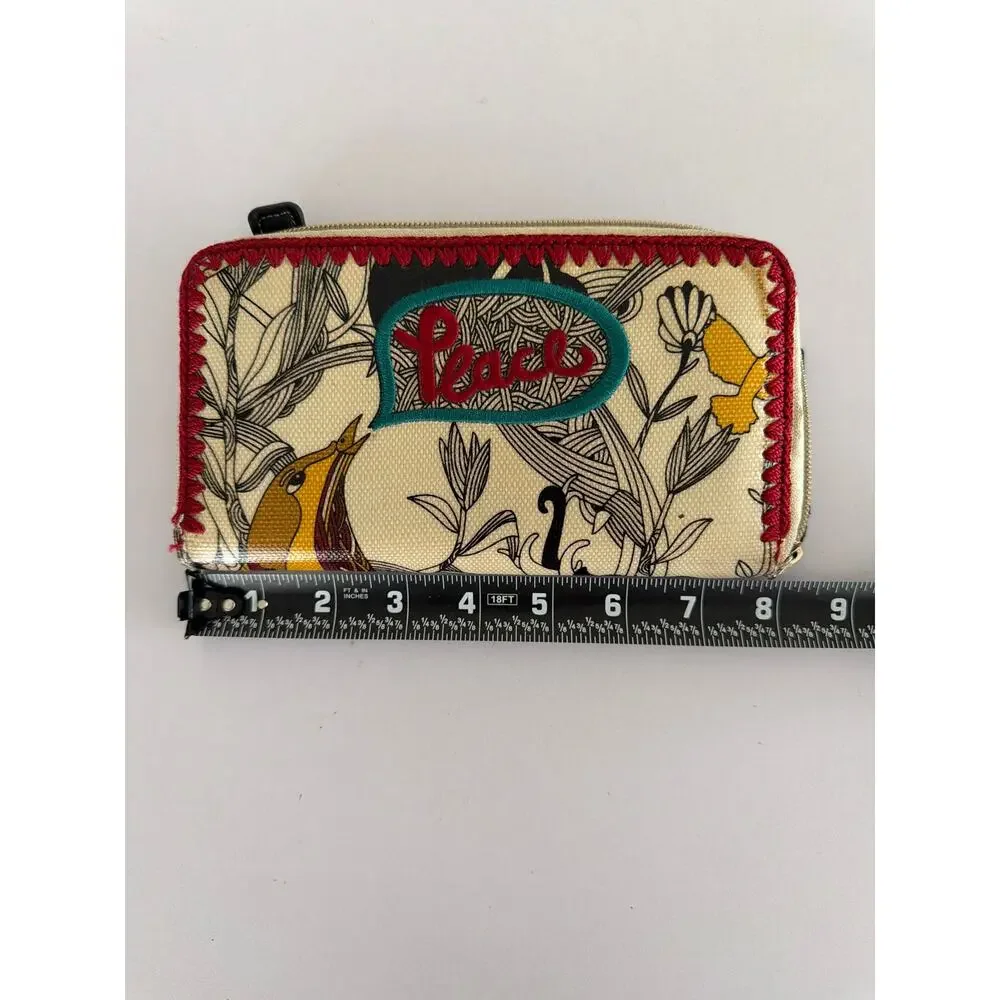 The Sak Sakroots Peace Coated Canvas Zip Around Wallet Floral Boho Embroidered